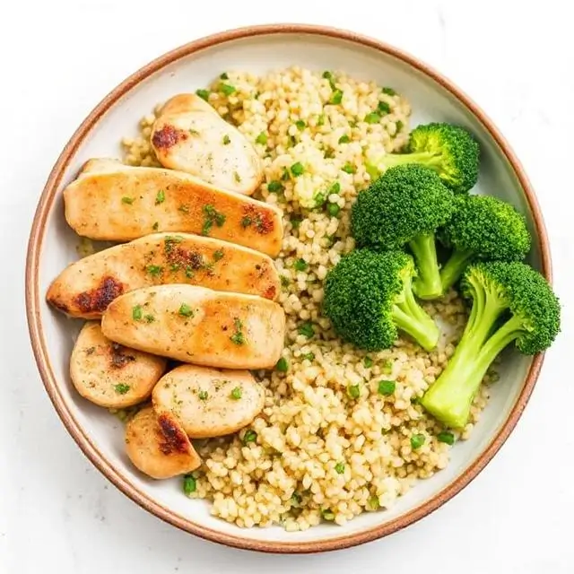 A balanced meal with chicken, quinoa, and broccoli.